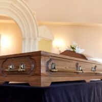 funeral and mourning concept - coffin at orthodox church